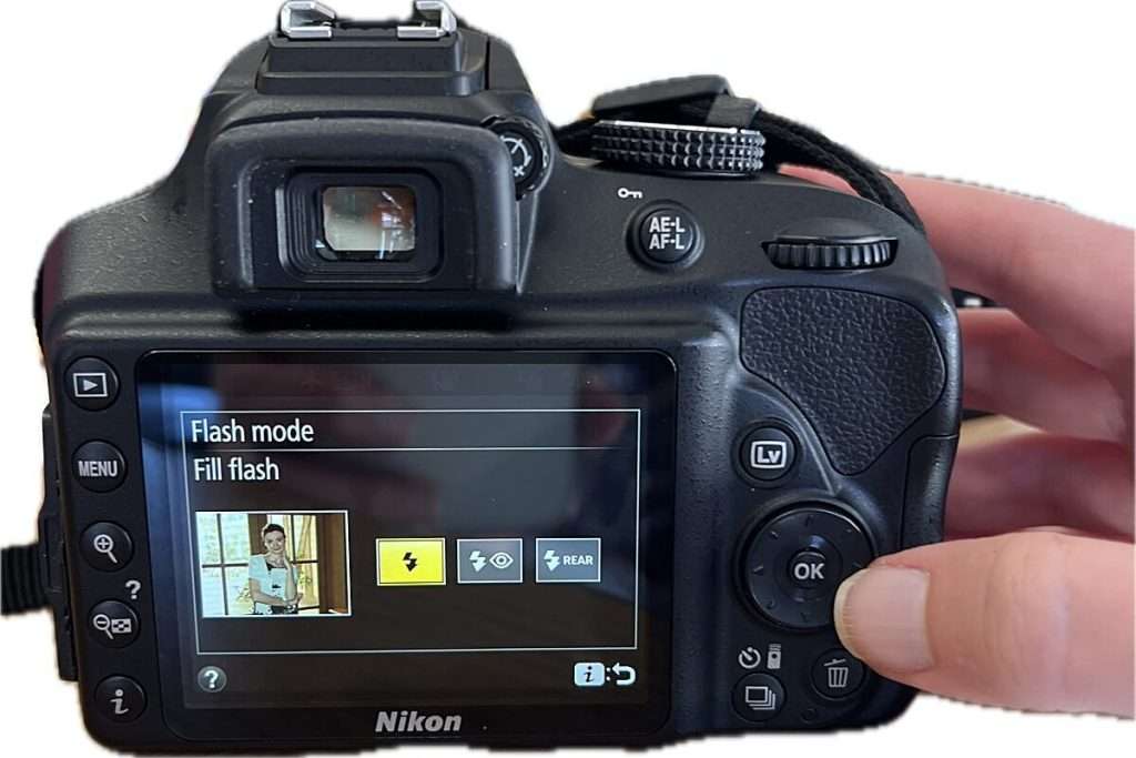 Camera screen showing flash mode set to "Fill flash" with flash icon highlighted, illustrating flash settings in camera settings for beginners.